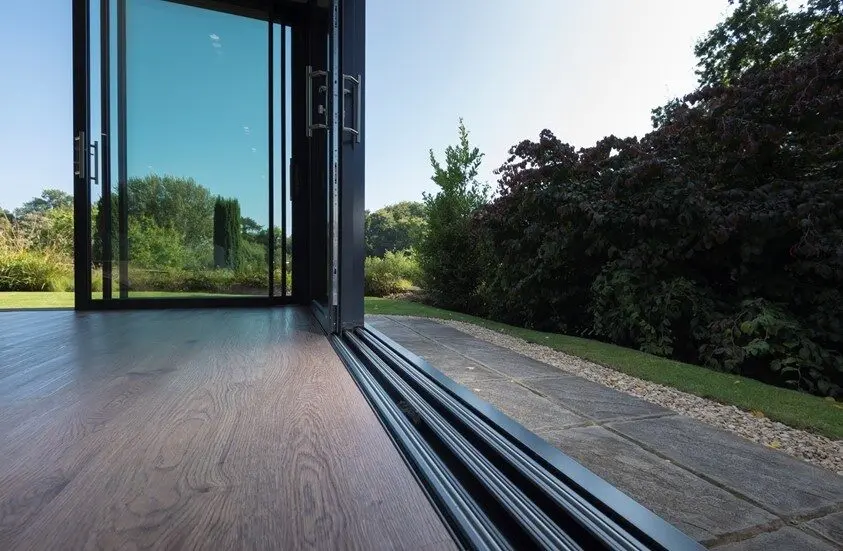 Custom track profile fitted to an older Atlanta sliding door.