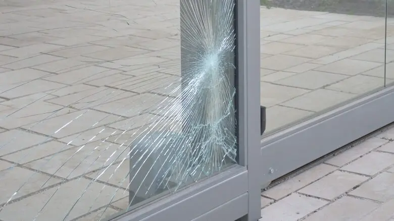 Shattered sliding glass door panel that needs glass replacement